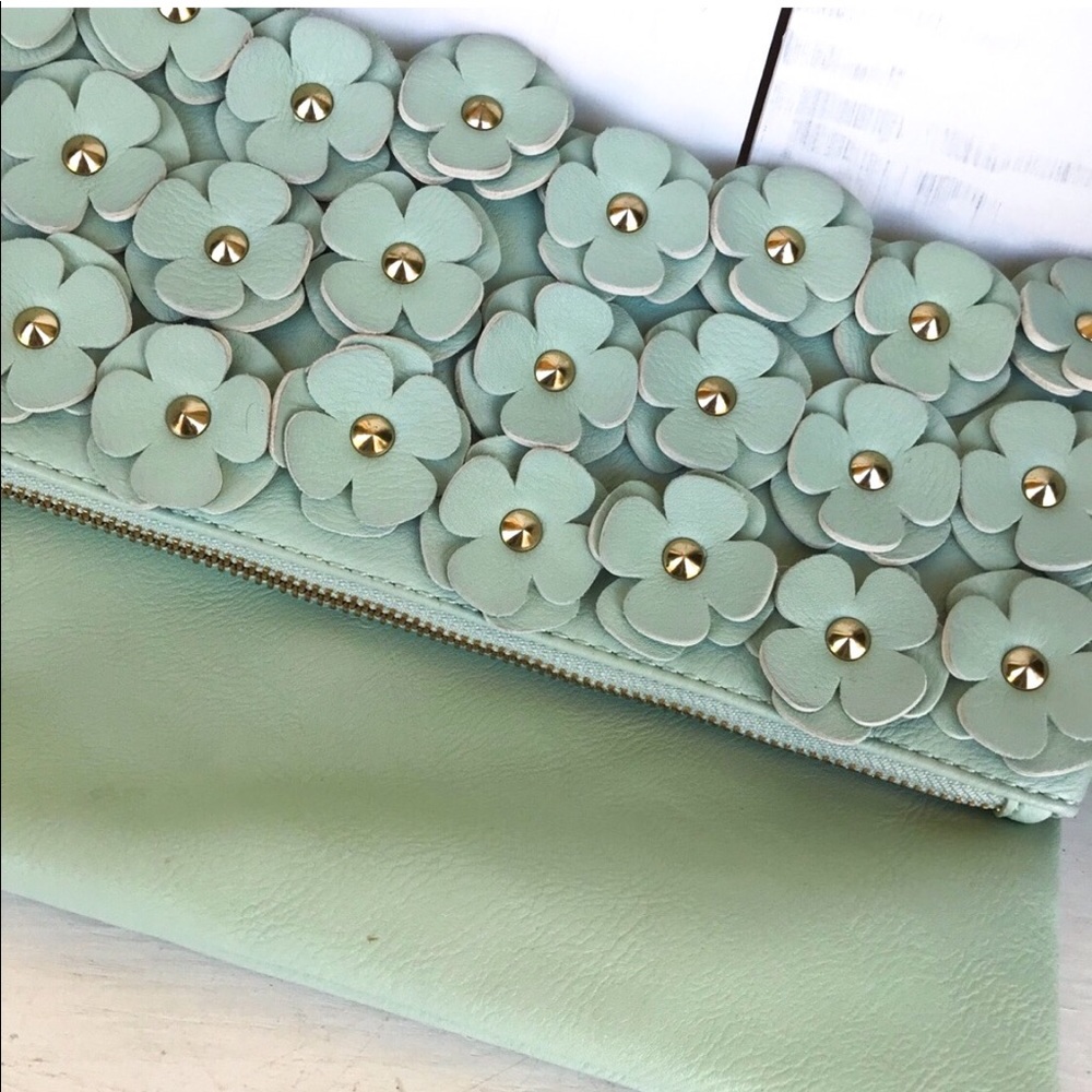 Aldo mint green floral appliqué clutch